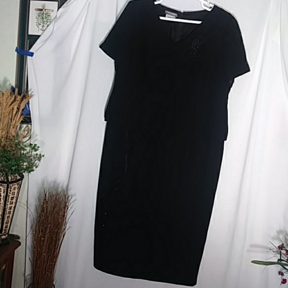 Women Black Dress with designs on the left sleeve